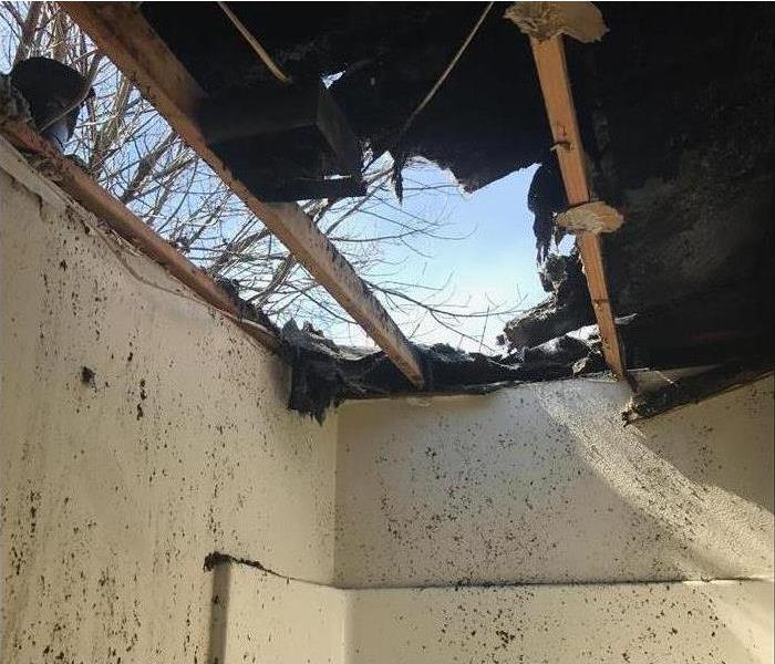 a burned off roof after a fire