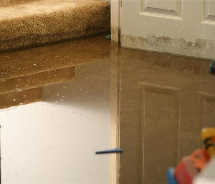 Flooding can allow moisture to seep into the floorboards and cause expanding and contracting which warps the flooring